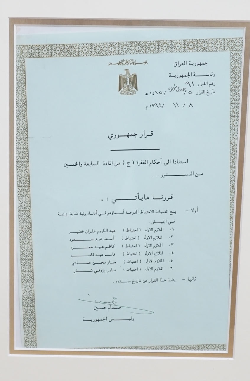 Saddam Hussein interest (1937-2006), an official Arabic document granting the permanent appointment as officers of six soldiers, signed by Saddam Hussein, president of the Republic of Iraq, dated 1994, leaf 30 x 19.5cm